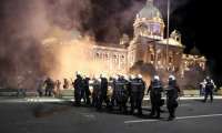 В результате протестов в Белграде пострадали шесть полицейских и двое местных жителей